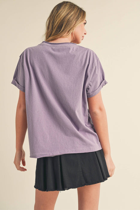 Soft women’s Mali Baby Tee paired with layered jewelry and casual summer style