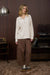 Relaxed fit waffle knit pullover with exposed seam and raw edge detail