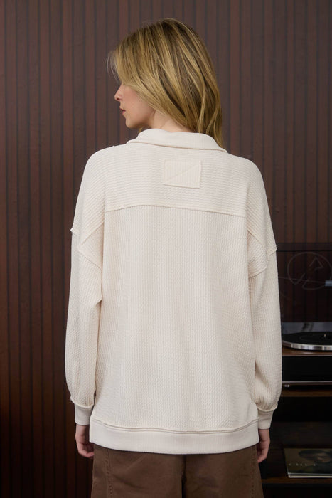 Back View: layering long sleeve waffle knit top with half zip front