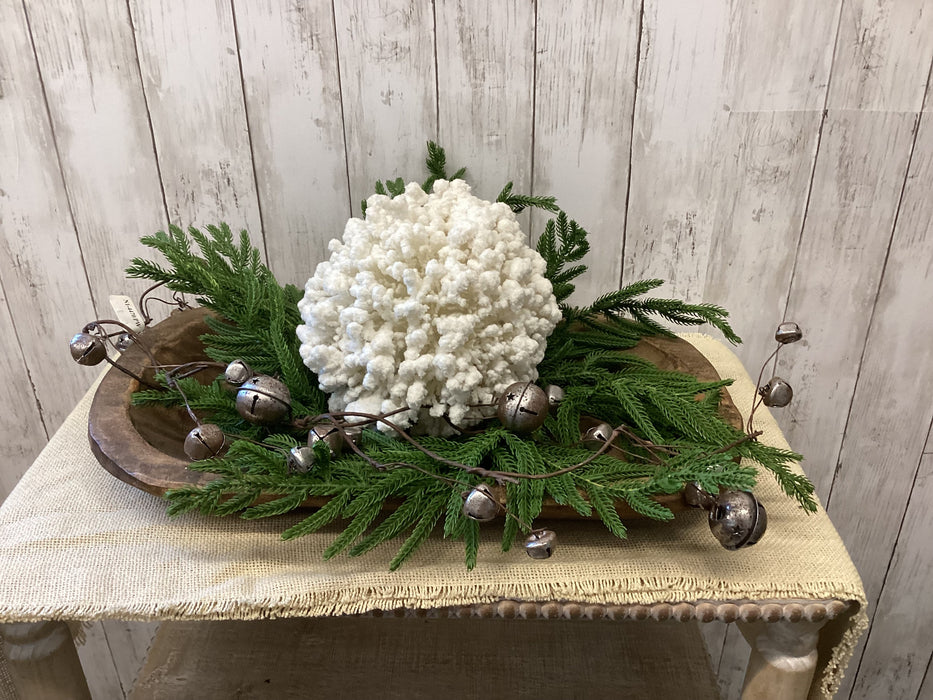 Close-up of realistic Douglas pine artificial candle ring mini wreath with natural textured needles for Minnesota holiday decorating