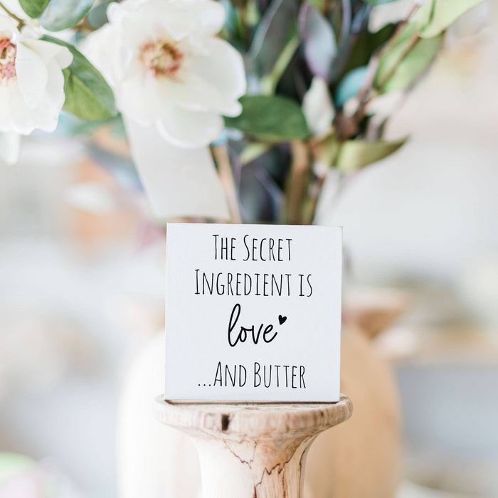 The secret ingredient is love and butter  3x3 Sign