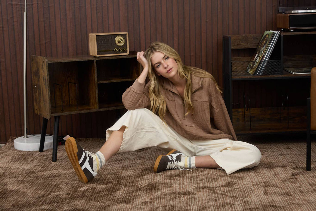 Women’s casual half zip knit top in solid waffle pattern