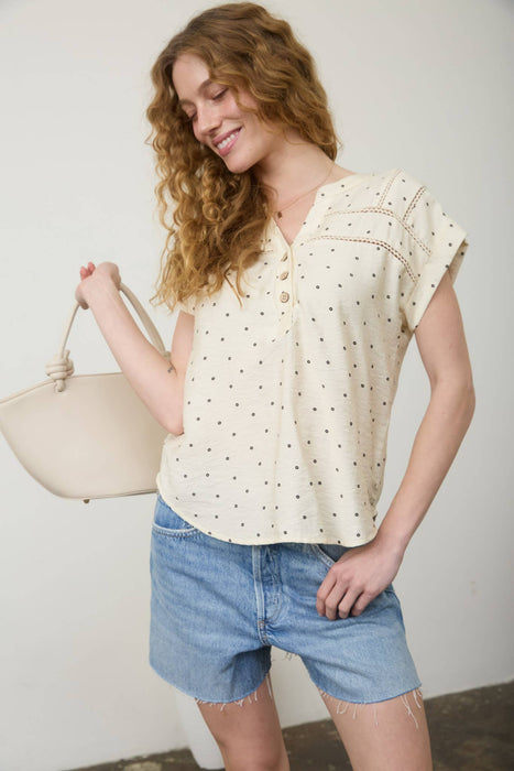 Feminine casual lace trim shirt boutique clothing display