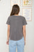 Lightweight relaxed cotton top styled with denim pants