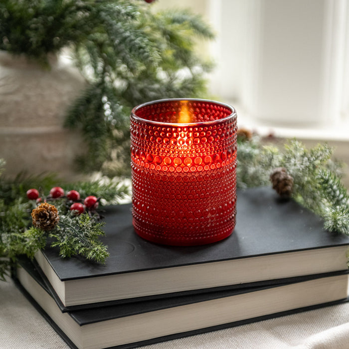 Red glass LED candle with dotted pattern perfect for vintage-style home decor