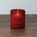 Red glass LED candle with dotted pattern perfect for vintage-style home decor