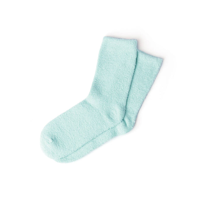 Aloe-infused Lemon Lavender spa socks folded neatly in pastel shades – ideal winter wellness item from Heartland Store MN