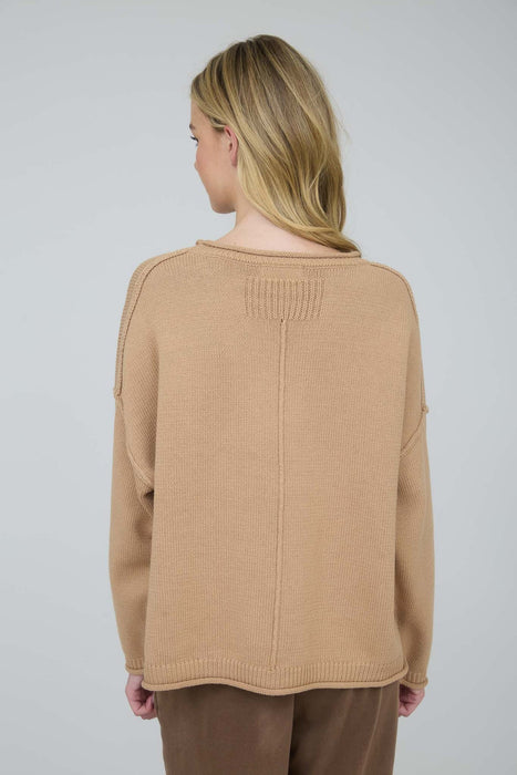 Extended shoulder sweater in neutral tan for Minnesota cold weather