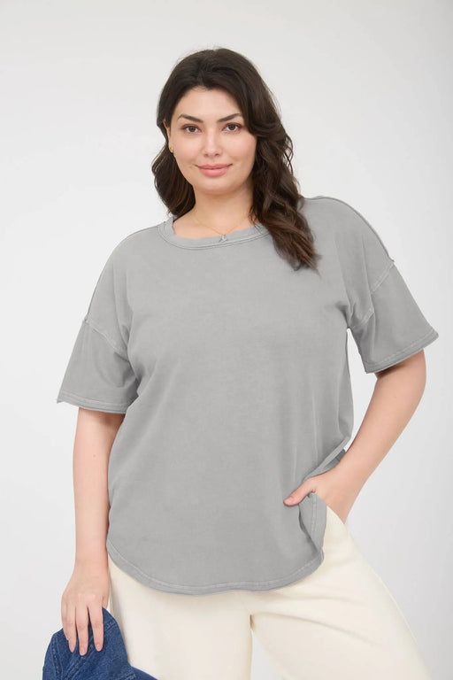 Curvy women’s relaxed fit cotton tee with exposed seam detail