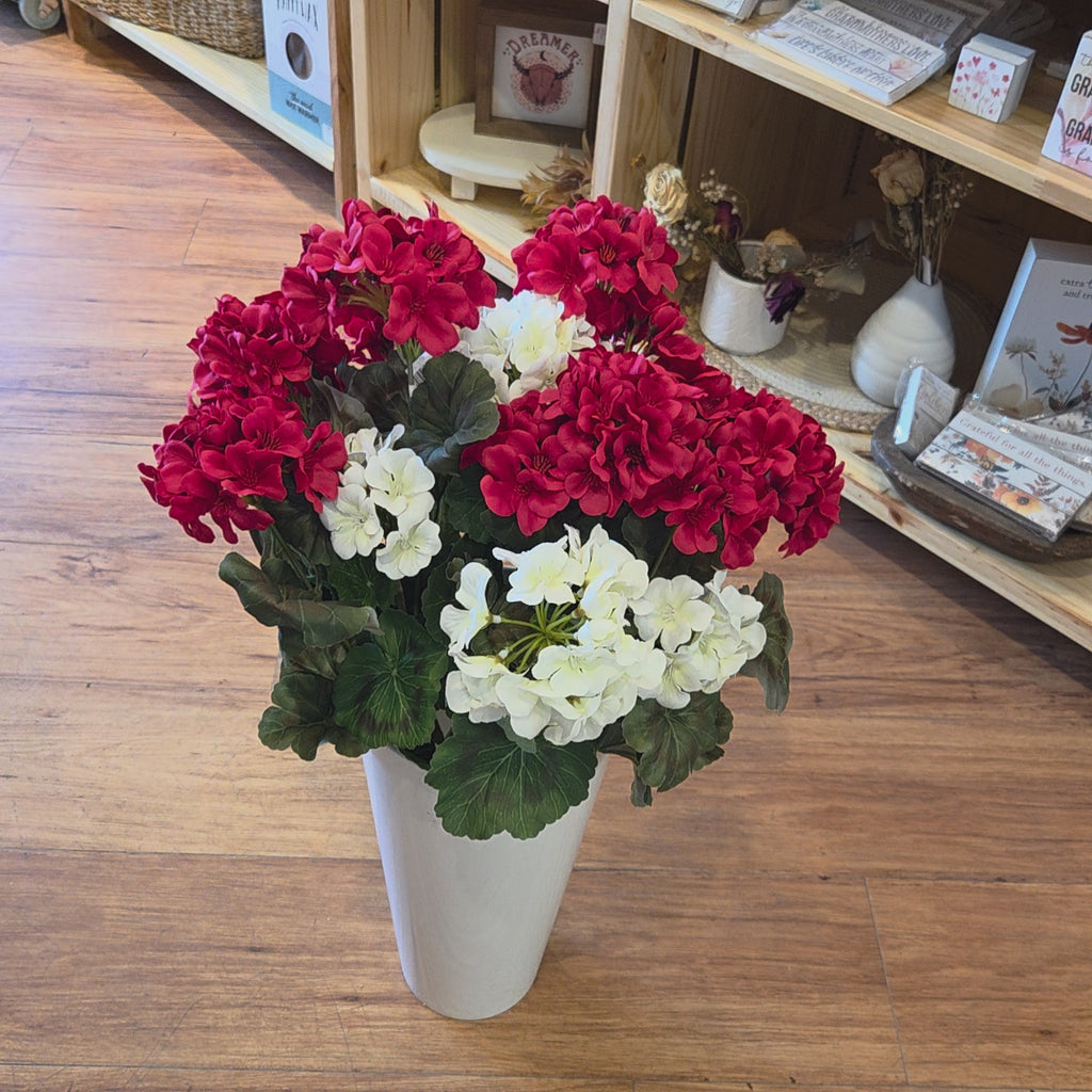 Artificial patriotic cemetery flowers with red geranium blooms perfect for veteran.