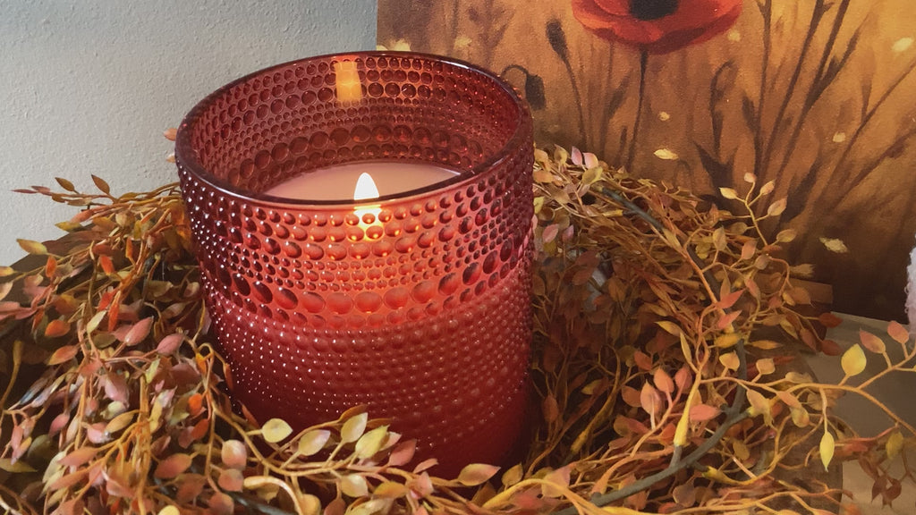 Red glass LED candle with dotted pattern perfect for vintage-style home decor