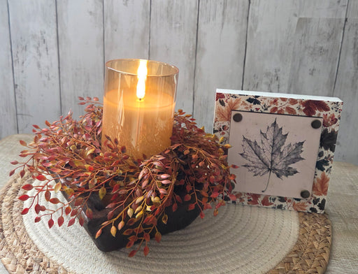 Artificial 8 inch rust orange berry candle ring displayed on white background showing detailed berries and natural texture