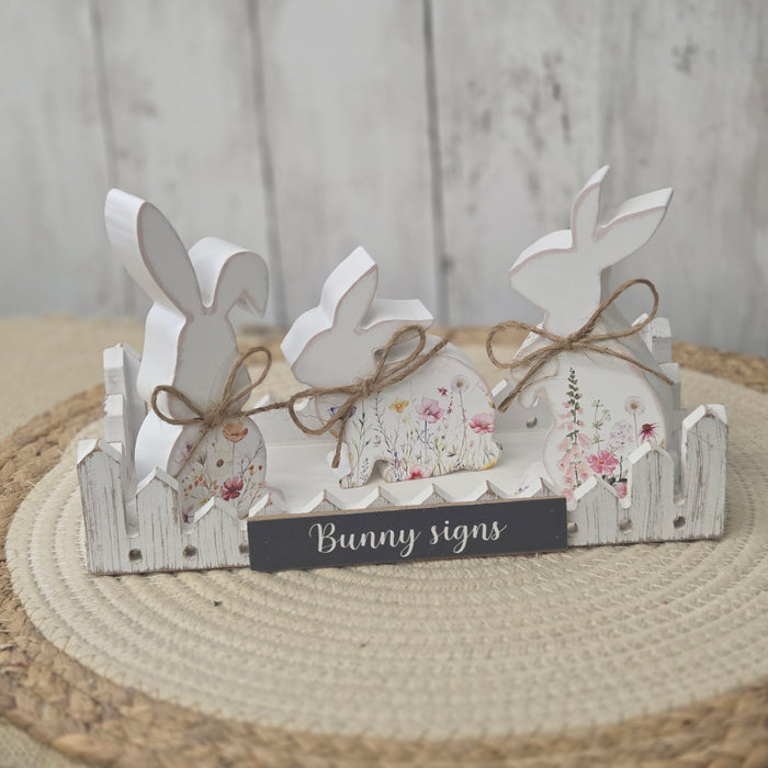 Spring farmhouse bunny decoration set with three wooden bunnies