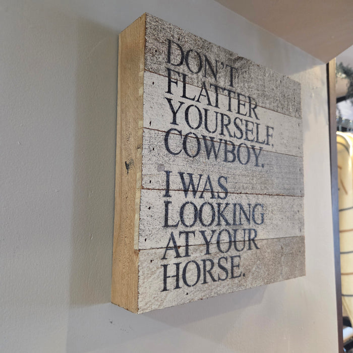 Cowboy-themed wooden wall décor sign