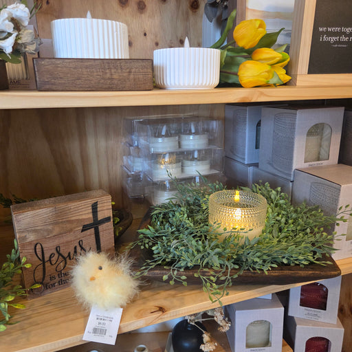 faux greenery candle ring centerpiece with pillar candle