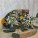 Pastel fresh flower bundle with daisies and seasonal blooms in soft spring colors