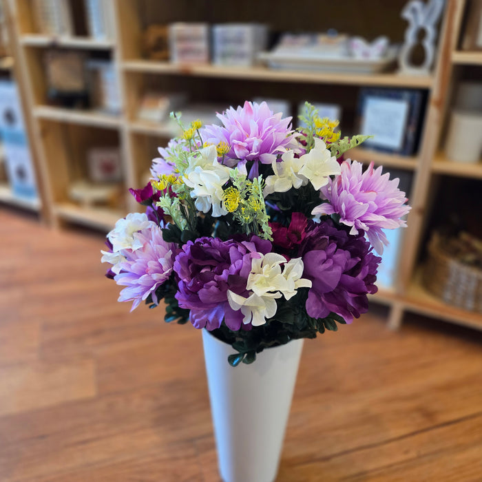 Outdoor memorial flowers for cemetery vase in purple and yellow