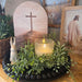 faux greenery candle ring centerpiece with pillar candle