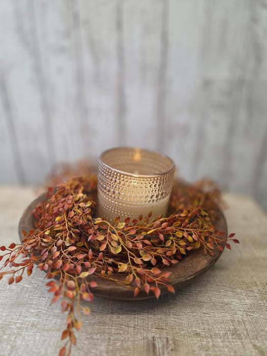 Autumn garland used as a candle ring centerpiece – cozy home decor