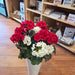 Outdoor memorial geranium arrangement for gravesite decoration