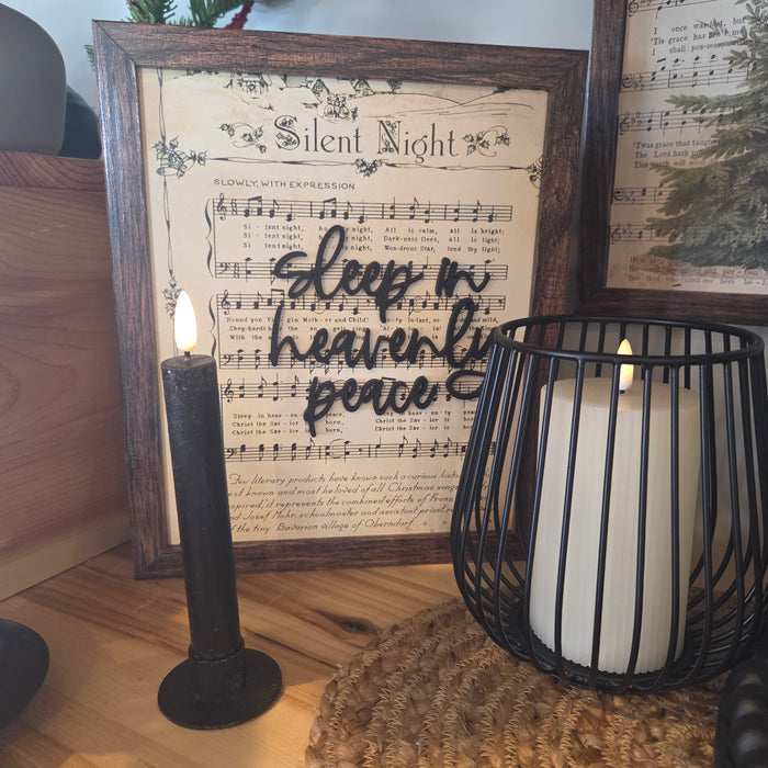 7.25” black taper LED candle with lifelike 3D flame and automatic 6-hour shutoff. Stylish and safe home décor near Winona & Rochester, MN.