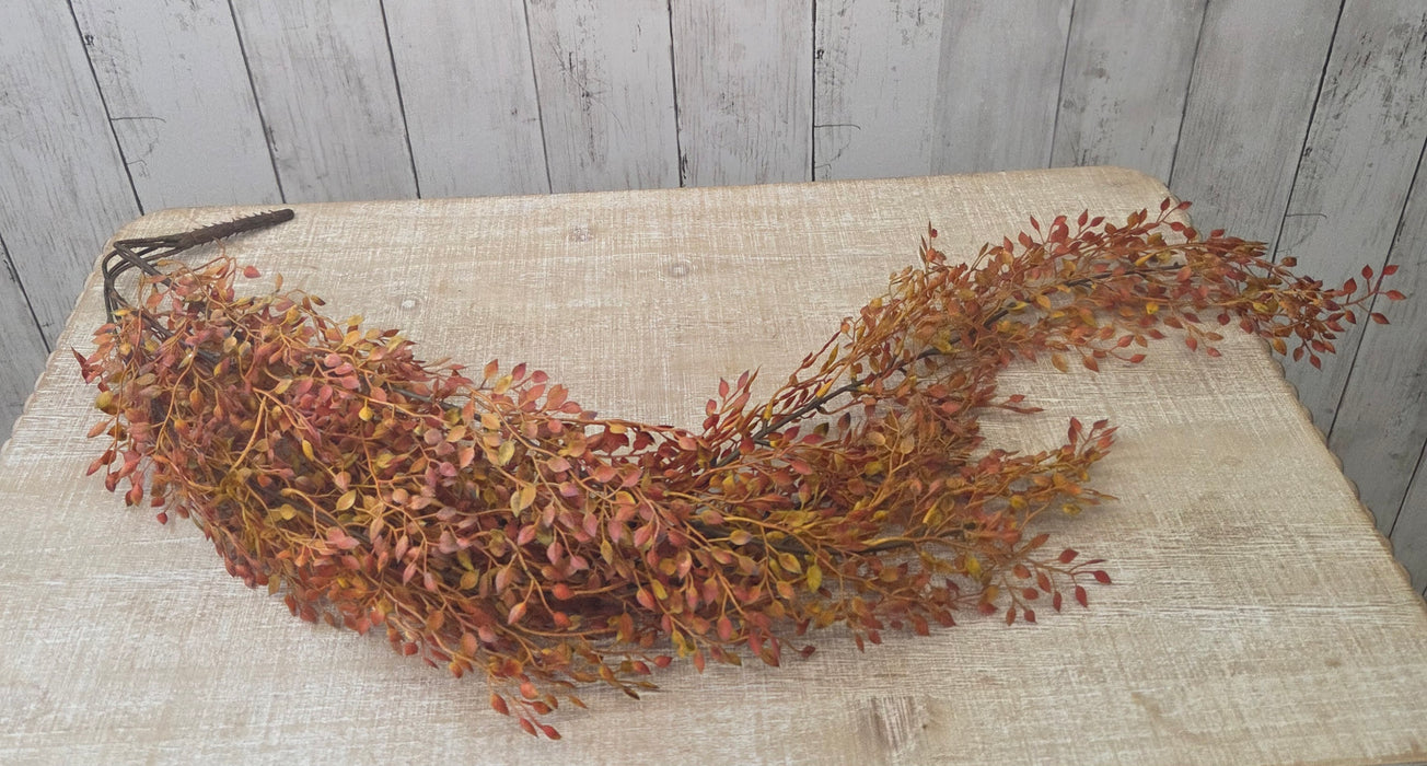 32-inch artificial rust orange berry garland for fall decorating