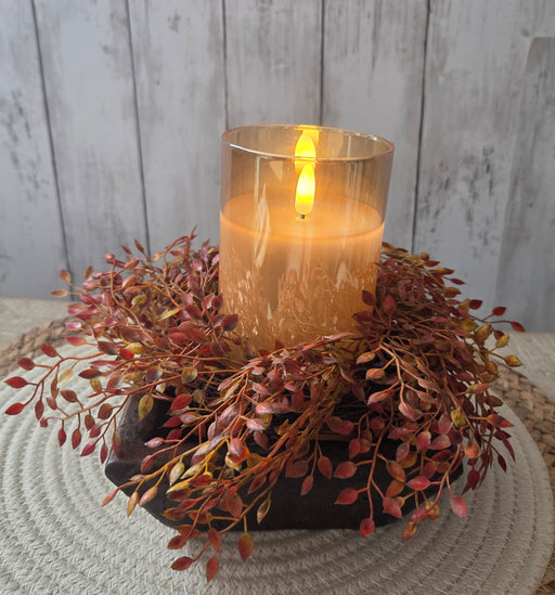Artificial berry candle ring shown from side angle demonstrating 8 inch diameter and circular shape