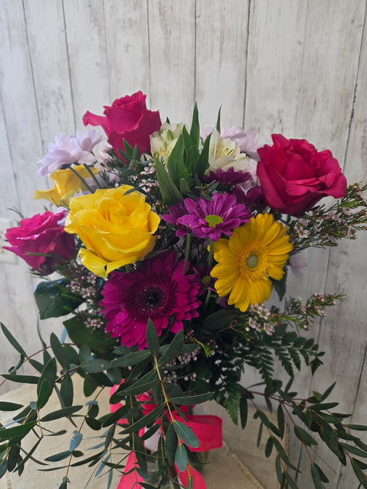 Handcrafted fresh flower bouquet with eucalyptus and filler flowers available for local pickup and delivery at Heartland Store MN