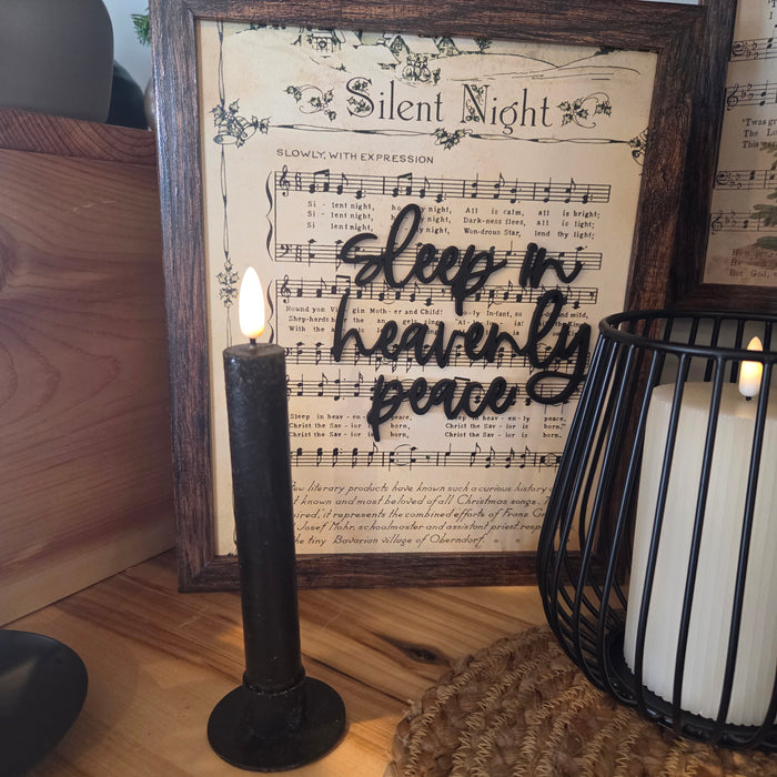 Add elegance with a 7.25” black LED taper candle featuring a 3D flame and 6-hour timer. Flameless